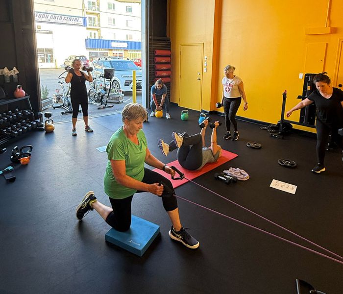 Clients working on small group training at Oceanside Strength Academy