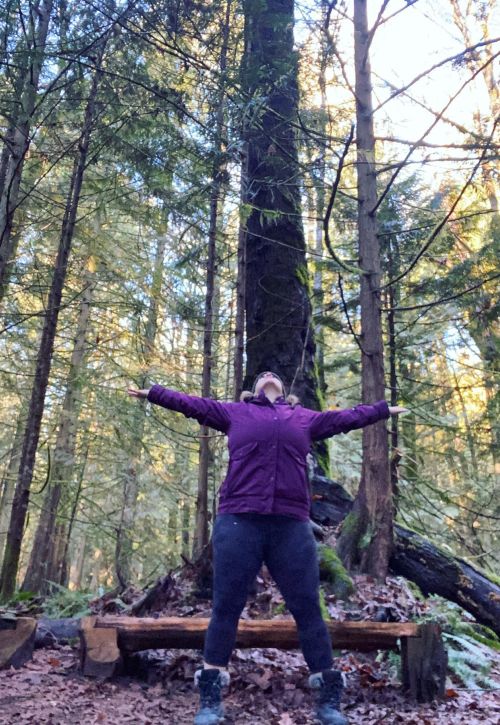 Jenna personal trainer parksville in the forest striking a pose purple jacket