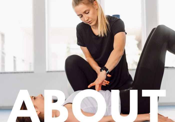 About hero image blonde personal trainer parksville helping female client with core workout